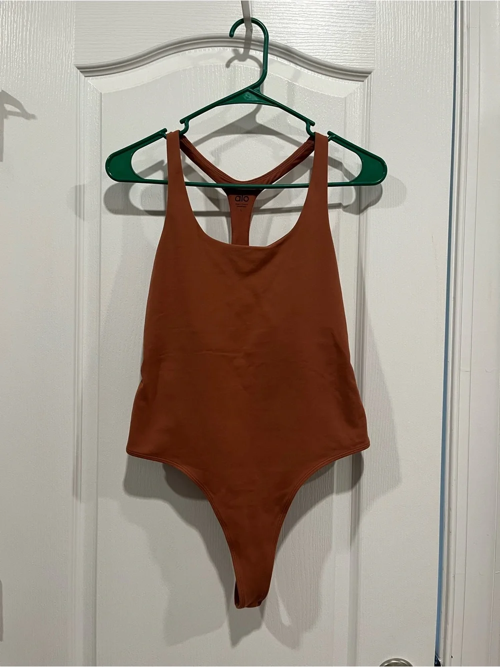 ALO Yoga *Rust* SleekBack Bodysuit size L